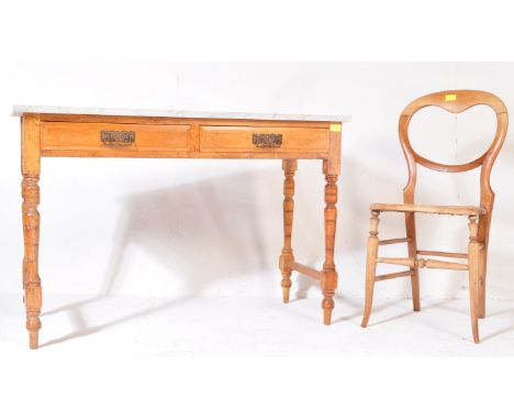 A late Victorian satin walnut and marble top hall table. Raised on ring turned legs with twin drawers to the frieze having&nb