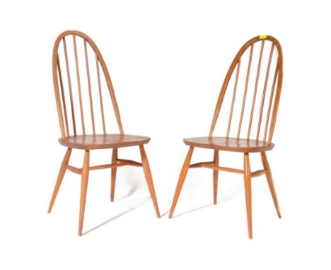 Lucian Ercolani - Ercol - A pair of retro mid 20th century beech and elm dining chairs being in the Quaker pattern with spind