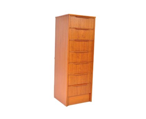 A retro vintage 20th Century circa 1980s teak wood seminaire 7-day chest of drawers. Of square form with a bank of seven draw
