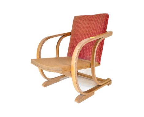 A vintage Art Deco 1940's bentwood beech and elm fire side lounge armchair. Having an upholstered red fabric back rest, curve