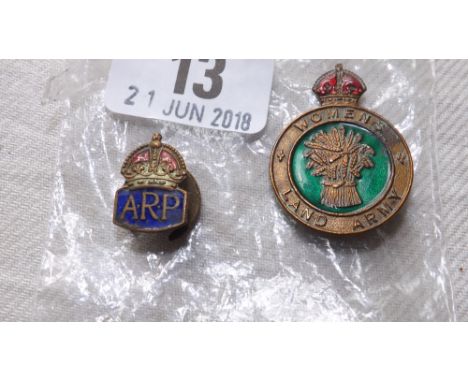 A Woman’s Land Army brass & enamel badge and  A.R.P. lapel badge       