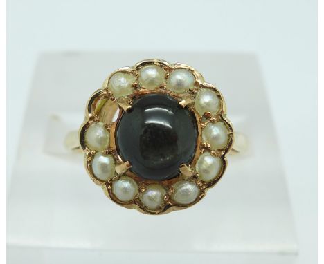 A 14ct gold, cabochon stone and pearl ring, lacking one pearl, 2.7g, R