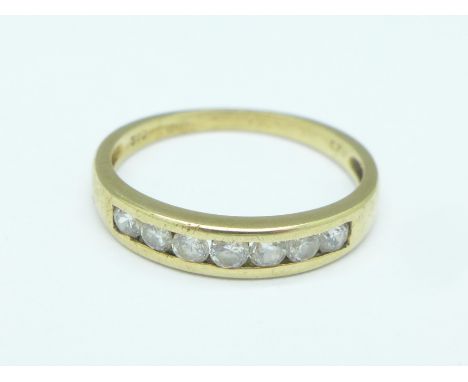 A 9ct gold and seven stone ring, 1.6g, L