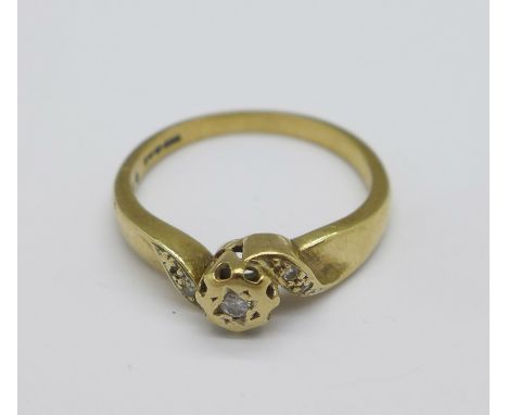 A 9ct gold and diamond ring, 2.4g, M