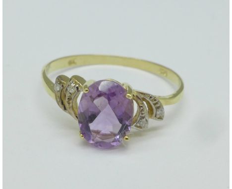 A 9ct gold, amethyst and small diamond ring, 1.4g, O