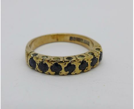 A 9ct gold and sapphire ring, 2.8g, L, stones scratched