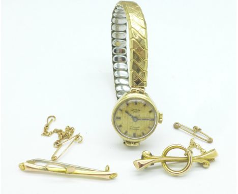Two 9ct gold brooches and a lady's 9ct gold cased Rotary wristwatch on a plated strap, brooches 2.2g