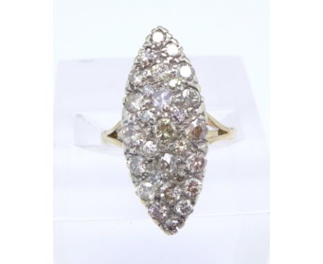 An 18ct gold and diamond navette shaped ring, mark worn, 3.9g, N