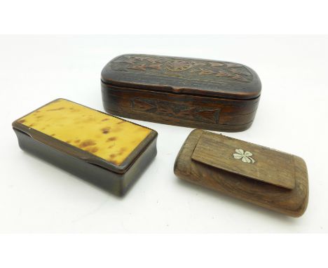 Three snuff boxes; tortoiseshell and horn, early large hand carved wooden box and a small wooden box with clover design