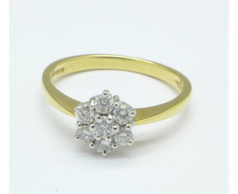 An 18ct gold and diamond cluster ring, 2.8g, M