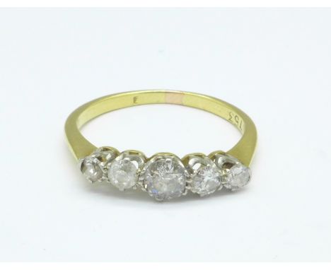 An 18ct gold, five stone diamond ring, hallmark worn, 2.2g, M