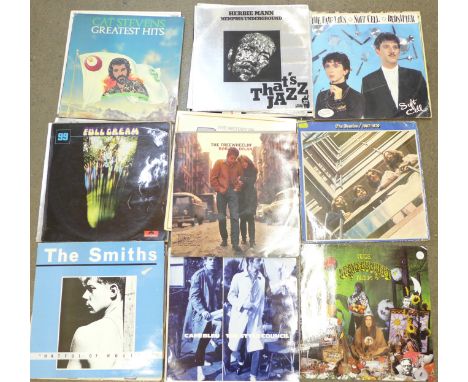 Twenty-four LP records and 12" singles including The Rolling Stones, The Beatles, Cat Stevens, The Smiths, Soft Cell, Bob Dyl