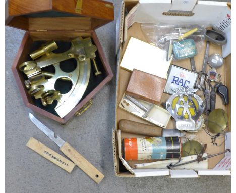 A sextant, an AA car badge, a rail pay cheque, fruit knives, caddy spoons, razors, whistles, fishing knife, etc.