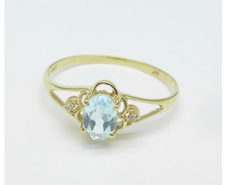 A 9ct gold, blue stone and small diamond ring, 1g, O