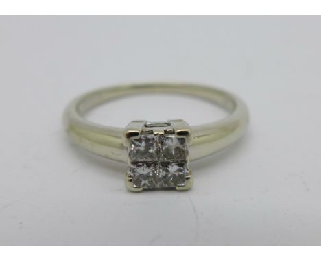 A 9ct white gold and diamond four stone ring, 2.2g, N