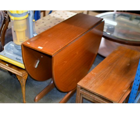 A TEAK GATE LEG TABLE     