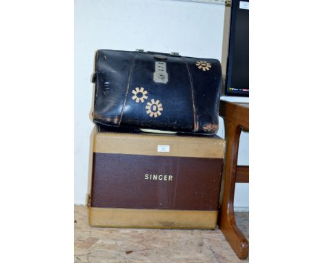 A GLADSTONE STYLE BAG WITH QUANTITY VARIOUS BOOKS &amp; A VINTAGE SINGER SEWING MACHINE     