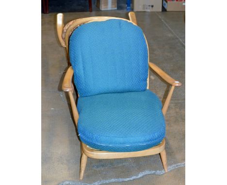 A PAIR OF ERCOL LIGHT OAK ARM CHAIRS     
