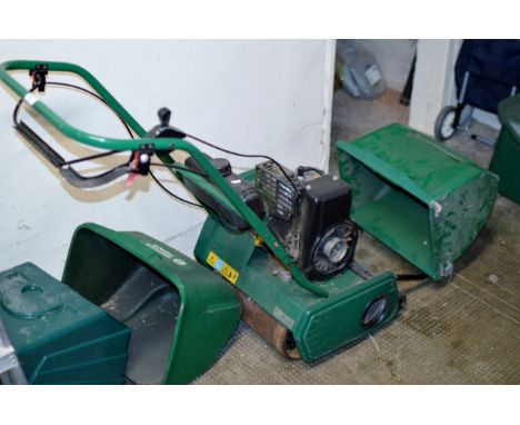 AN ENGINE LAWNMOWER     