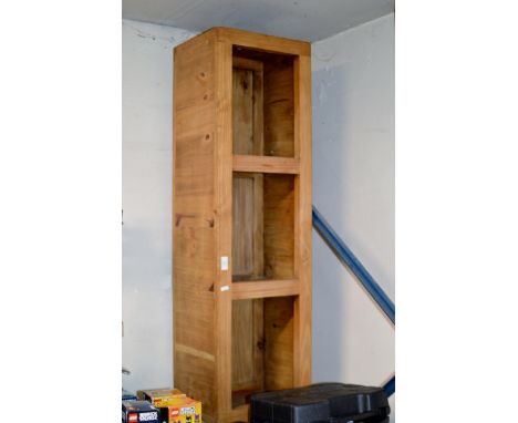 A MODERN OPEN SHELF UNIT     