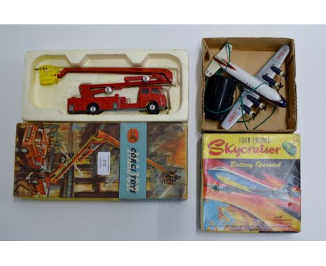 A VINTAGE BOXED CORGI TOYS SIMON SNORKEL FIRE ENGINE NUMBER 1127, TOGETHER WITH A VINTAGE BOXED LOUIS MARX &amp; CO TIN FOUR 