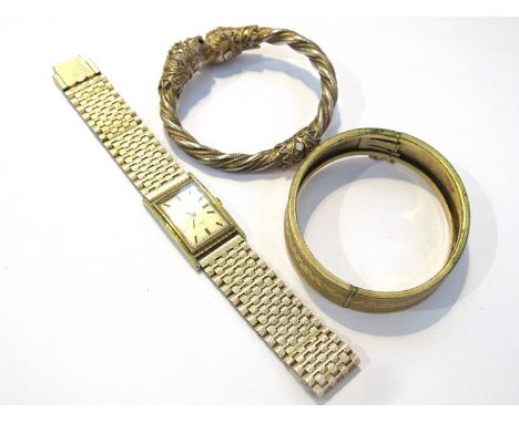 A rectangular "Rotary Vintage" ladies watch and metal strap, gilt metal circular bracelet and a double headed lion hinged bra