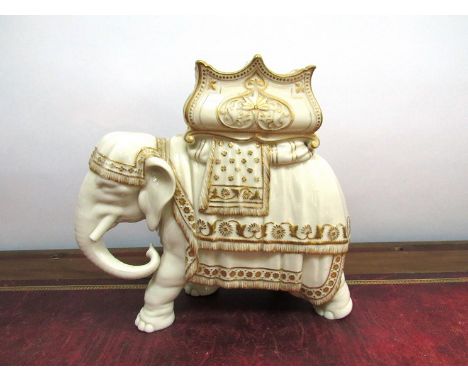 A Royal Worcester elephant figure, tusks a/f, 22cm long. (Oxburgh Hall collection)