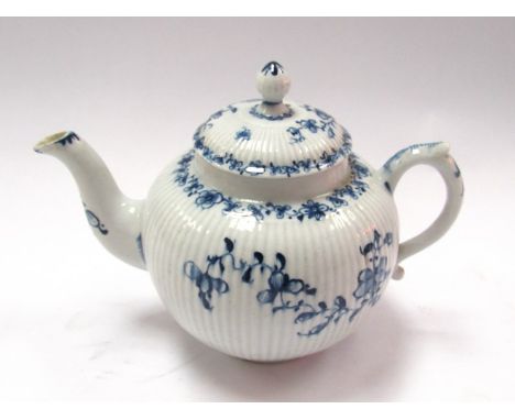 A rare 18th Century early Lowestoft porcelain blue and white teapot of spherical form with rib-moulded body and domed lid pai