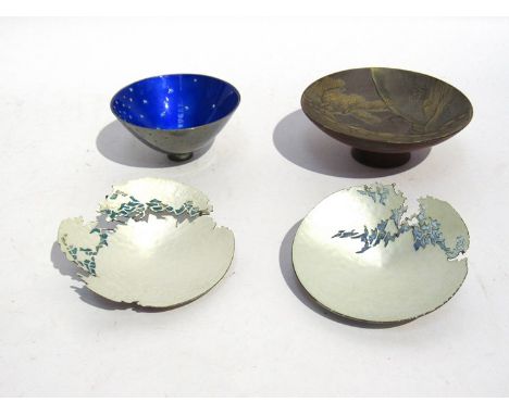 A Japanese lacquered miniature dish, blue enamel dish and sbstract roundels (4)