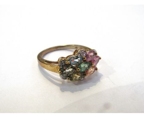 A 9ct gold dress ring set with different sapphires and diamond chips, 3.2g, size N/O 