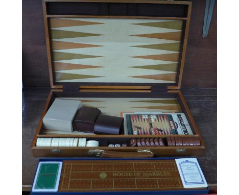 A cased Backgammon set and a Cribbage set, boxed 