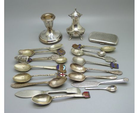 A silver candlestick with inscription, a silver pepperette, plated spoons and a cigarette case, (pepperette 55g) 