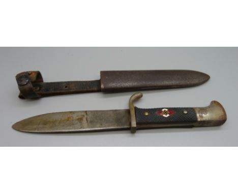 A German WWII Third Reich Youth dagger with scabbard, the blade marked A.W.Jr., Solingen, Ges.Geschutzt, the blade also signe