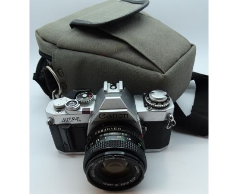 Camera - Canon AV1 35mm SLR & case 