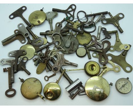Bag of clock keys, pendulum, compass etc. 