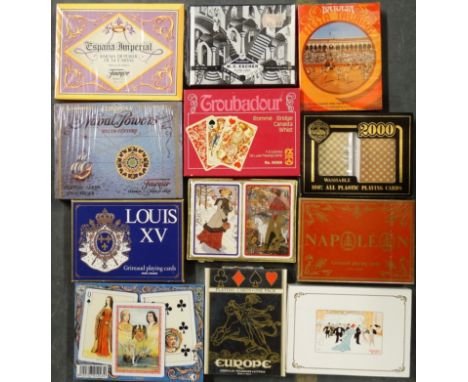 12 Packs of playing cards (in blue box) 
