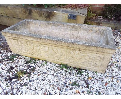 A stoneware rectangular trough decorated with scrolls of oak leaves, approx 22 cm x 71 cm x 27 cm 