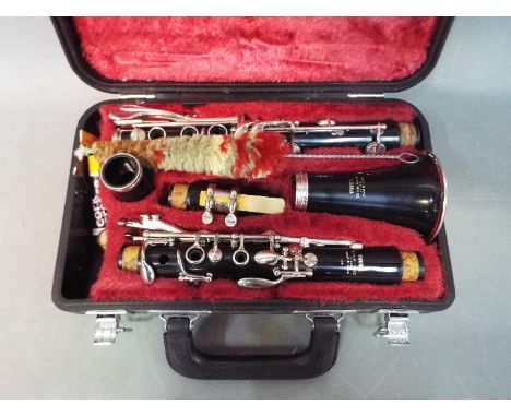 A Yamaha 26ii clarinet contained in hard case.