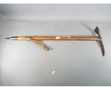 Military - Brades - A Brades ice axe, mid 20th century, with steel head, wooden shaft, adze and metal pick, sliding metal rin