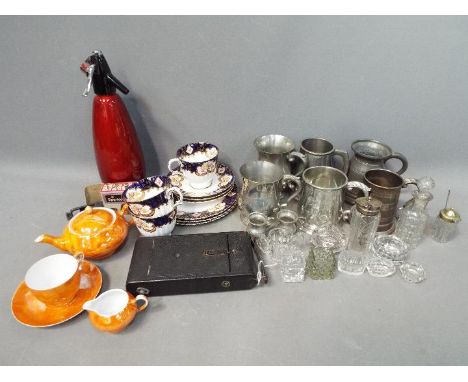 A mixed lot to include ceramics, pewter tankards, glass cruets, an Ensign folding camera and similar.