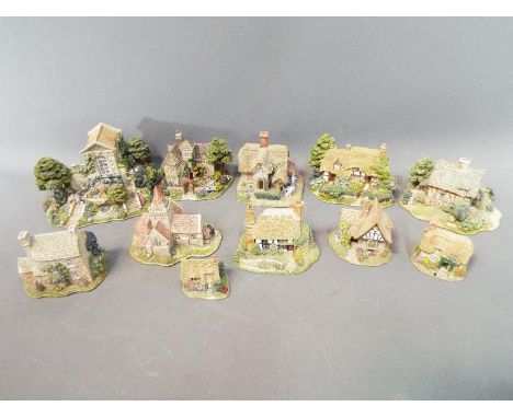A collection of eleven Lilliput Lane models, all unboxed, to include 'Crathie Church, Balmoral', 'Loch Ness Lodge', 'Marigold