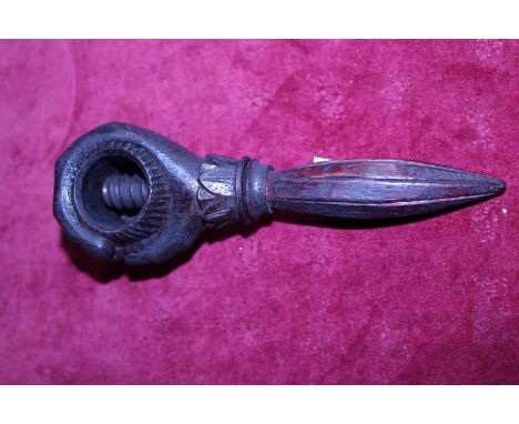 A treen nut cracker 