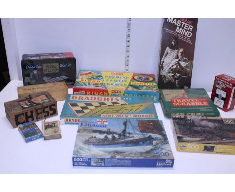 A job lot of vintage games including cards, dominoes, Scrabble etc 