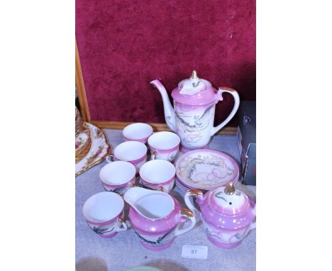 A pretty oriental fine porcelain tea service with Geisha girl to base 