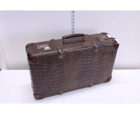 A vintage hide skin style case 