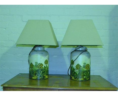 A Pair of tin tea caddy lamps, painted with rural scenes 