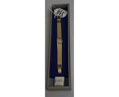 A 9ct gold 'Tissot' ladies dress watch with 9ct gold matching bracelet 