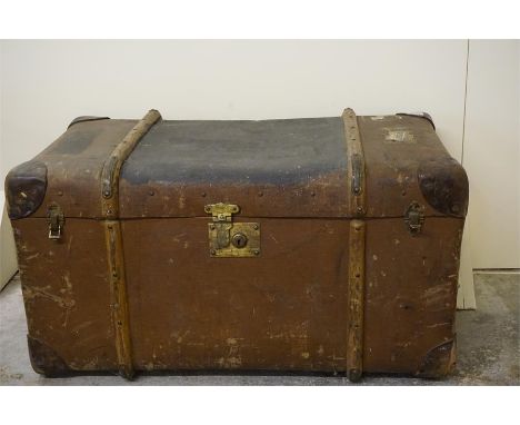 Large leather and canvas, wood bound travelling trunk 