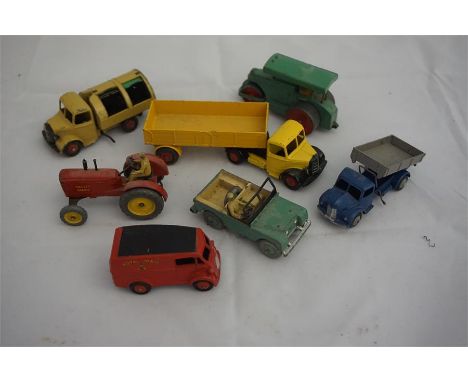 7 dinky toys, including steam roller, dustbin truck, tractor, jeep and 2 lorries and a royal mail van. (no boxes)