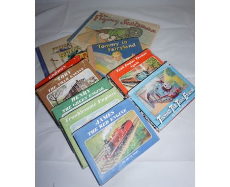8 volumes of 'Thomas the tank Engine' and 2 other children books including 'flying Scotsman' and 'puffer, muffler and pip pip